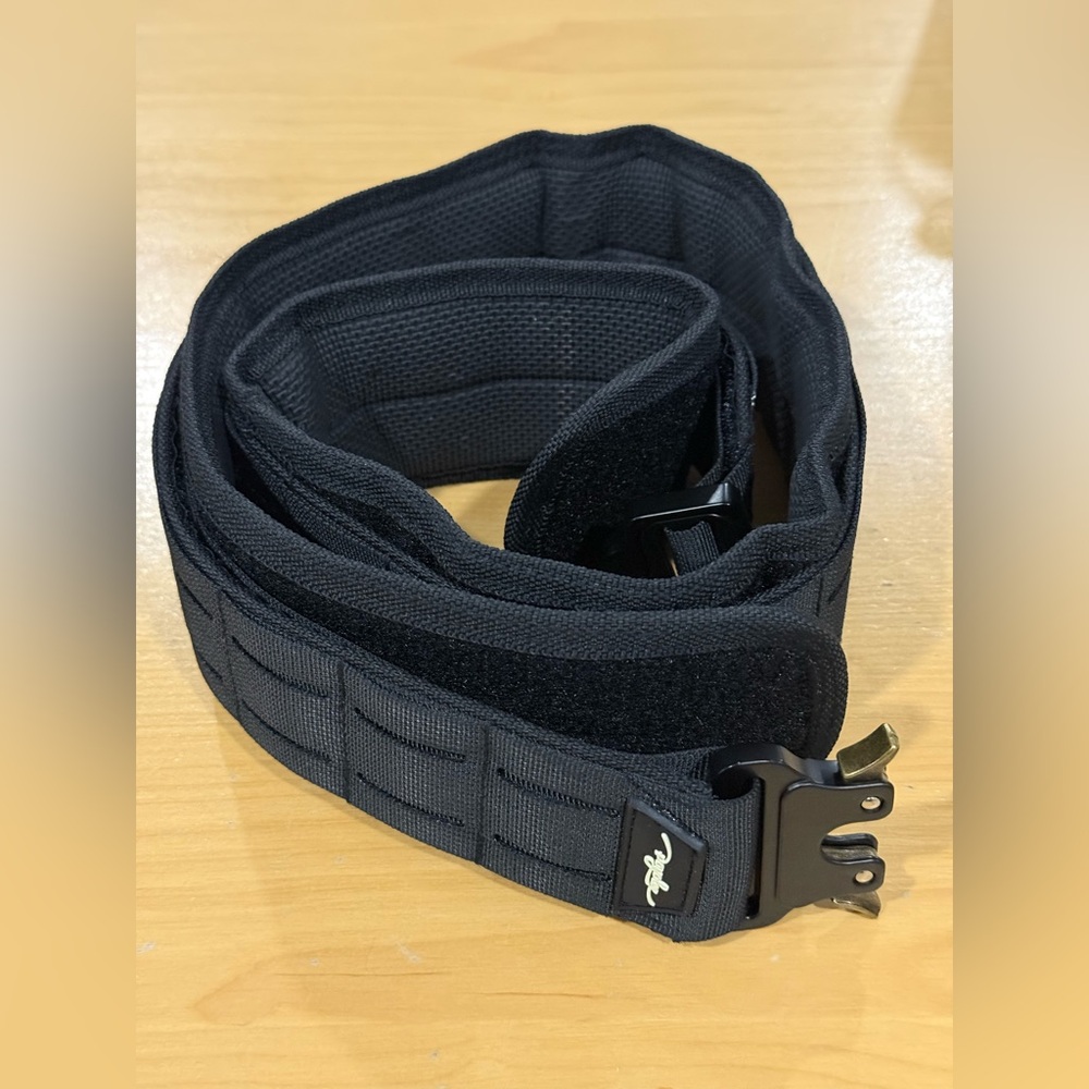 Poyolee Tactical Belt adjustable Sz. M/L 32”/34” black New (open box) black.